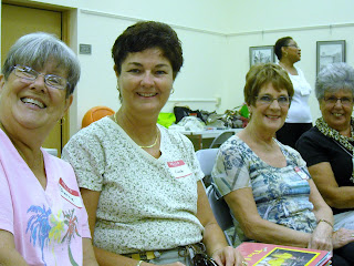 the smiling faces above attende...